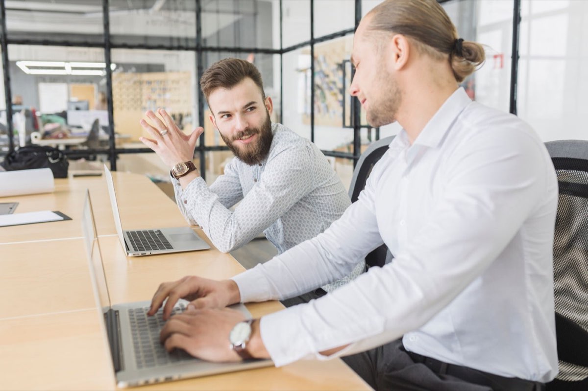 Consultants working with a client