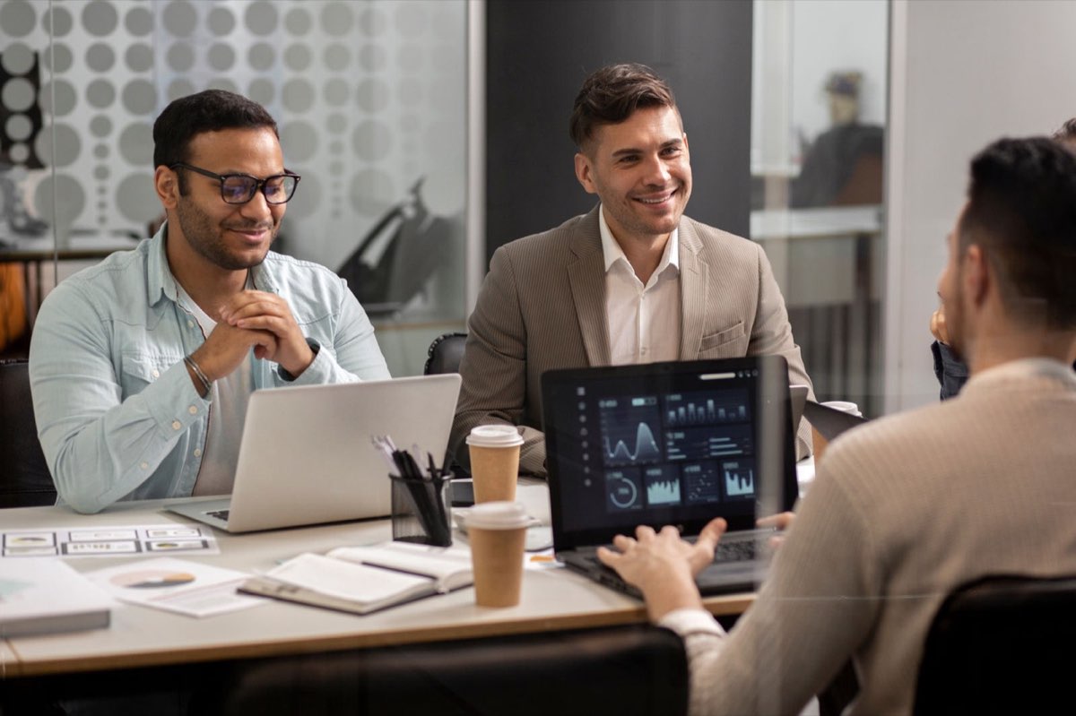 Technology consultants working with a client